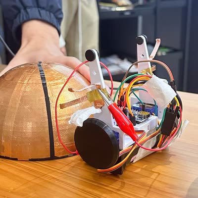 A student's copper-taped robot from the final project